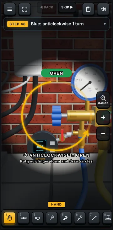 Opening the manifold valve with the vacuum gauge fitted in the simulator